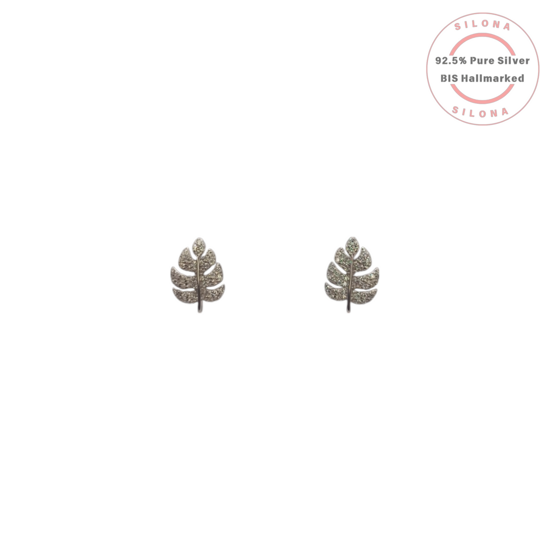 A pair of Silona's Pave Leaf Stud Earrings in 92.5 silver, set with sparkling cubic zirconia, on a white background.