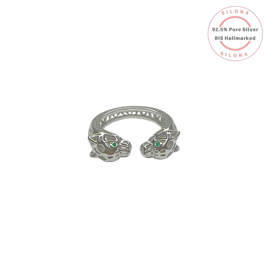 Silona's statement panther head cuff ring in 92.5 pure silver with green emerald-hue stone eyes, shown on a white background.