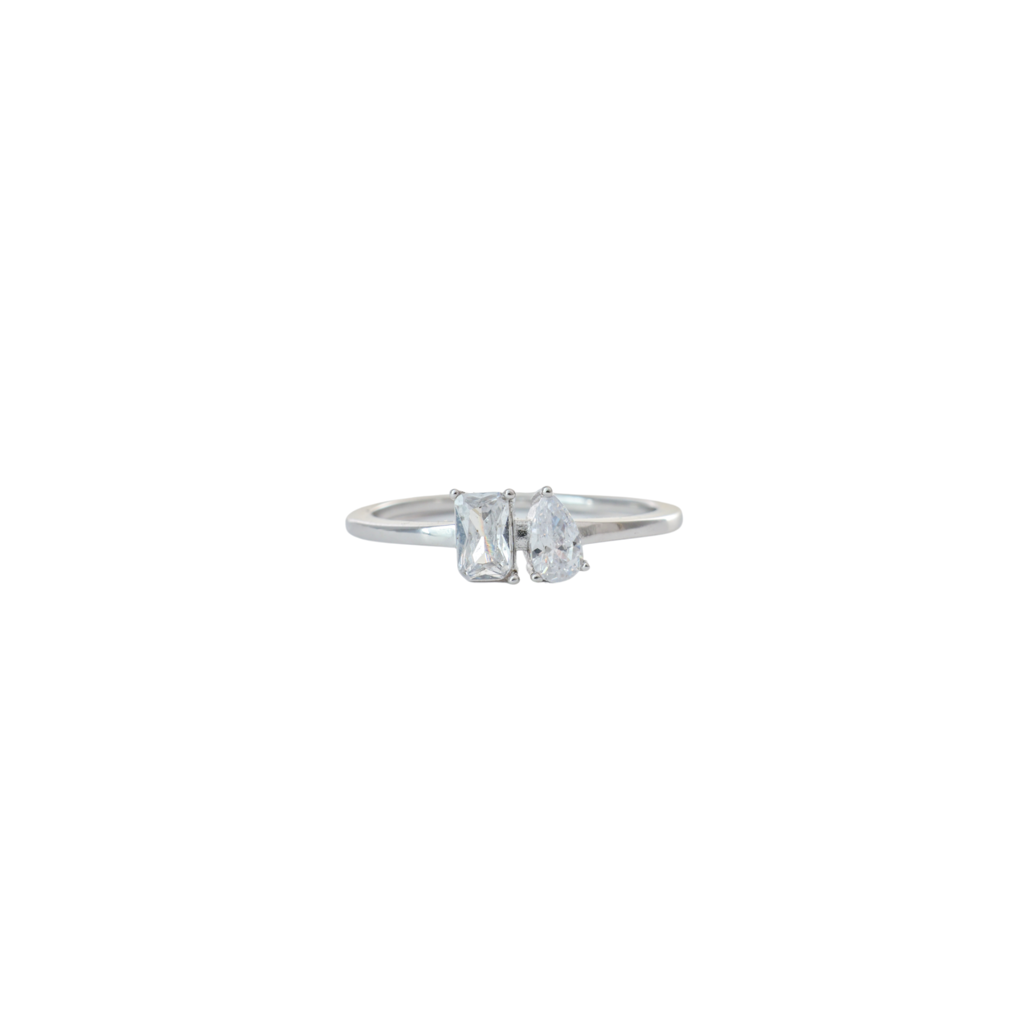 Minimalist silver Toi et Moi ring featuring side-by-side emerald cut and pear cut gems.