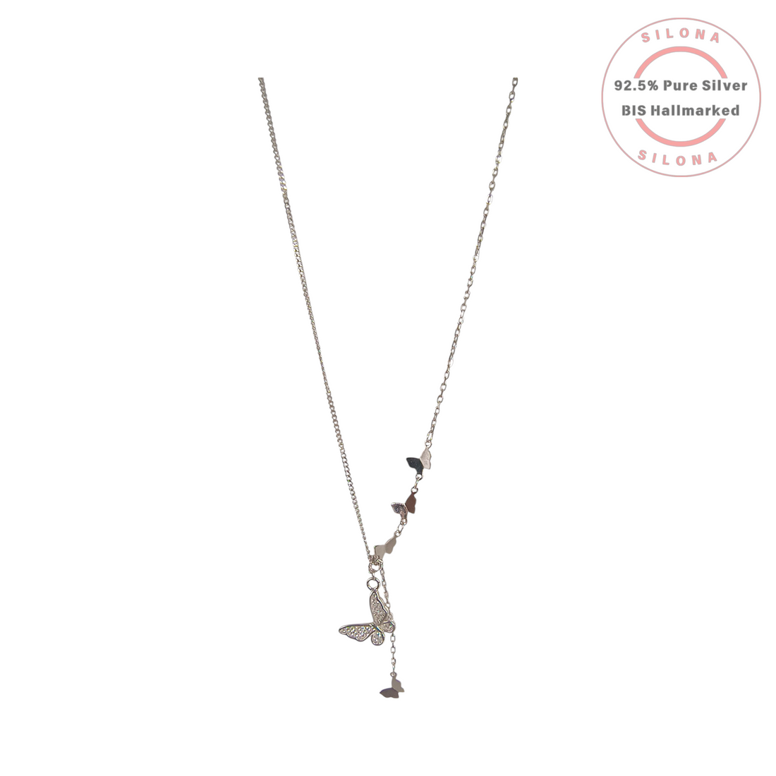 A silver lariat necklace featuring a central pave cubic zirconia butterfly with smaller polished butterfly charms accenting the chain.