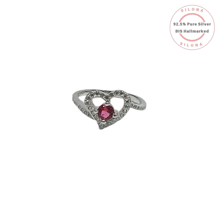 Silona Crimson Heart Pave Ring in 92.5 silver, featuring a central round ruby-hued stone surrounded by a heart-shaped halo of clear zircons.