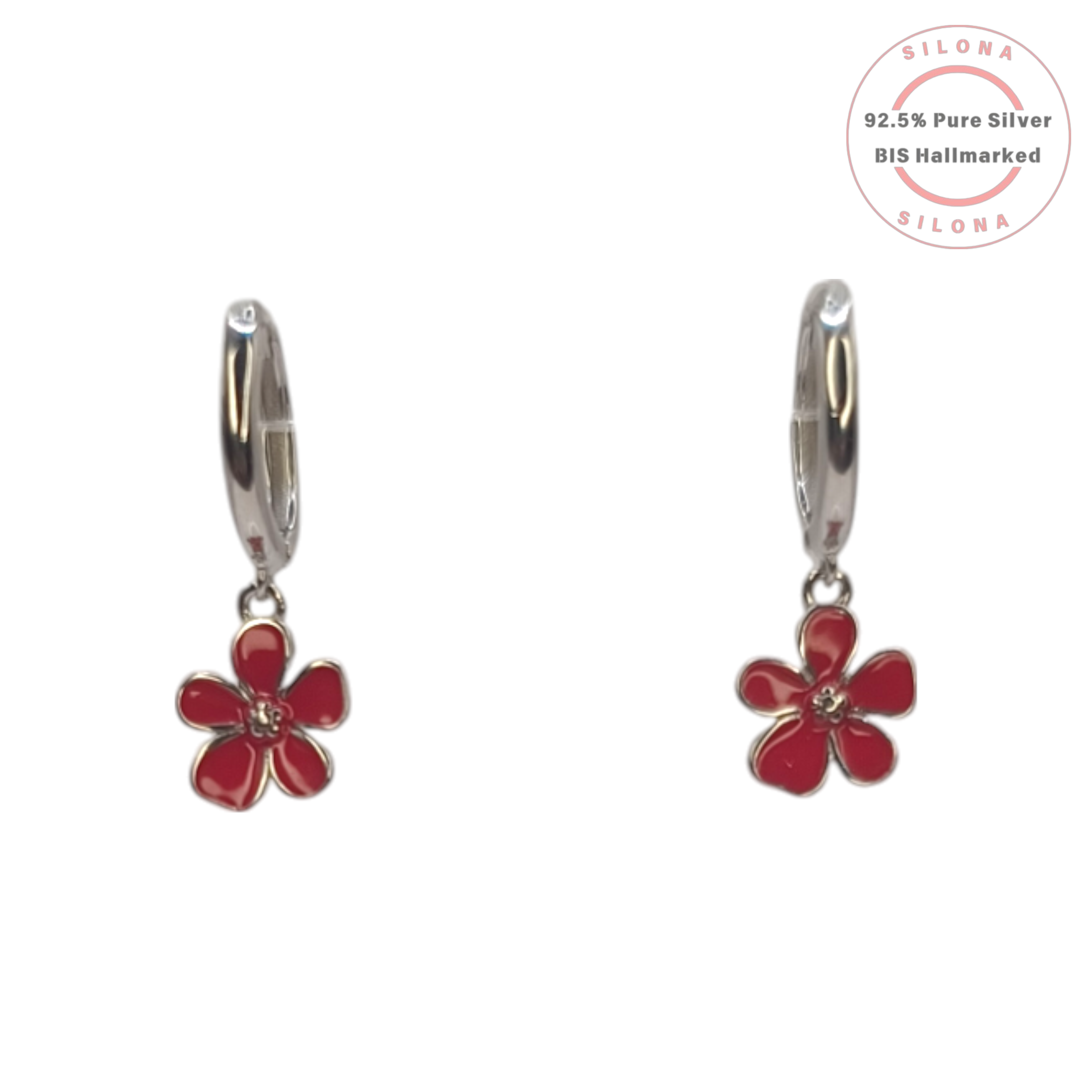 Pair of Silona silver huggie hoop earrings with a dangling red enamel flower charm on a white background.