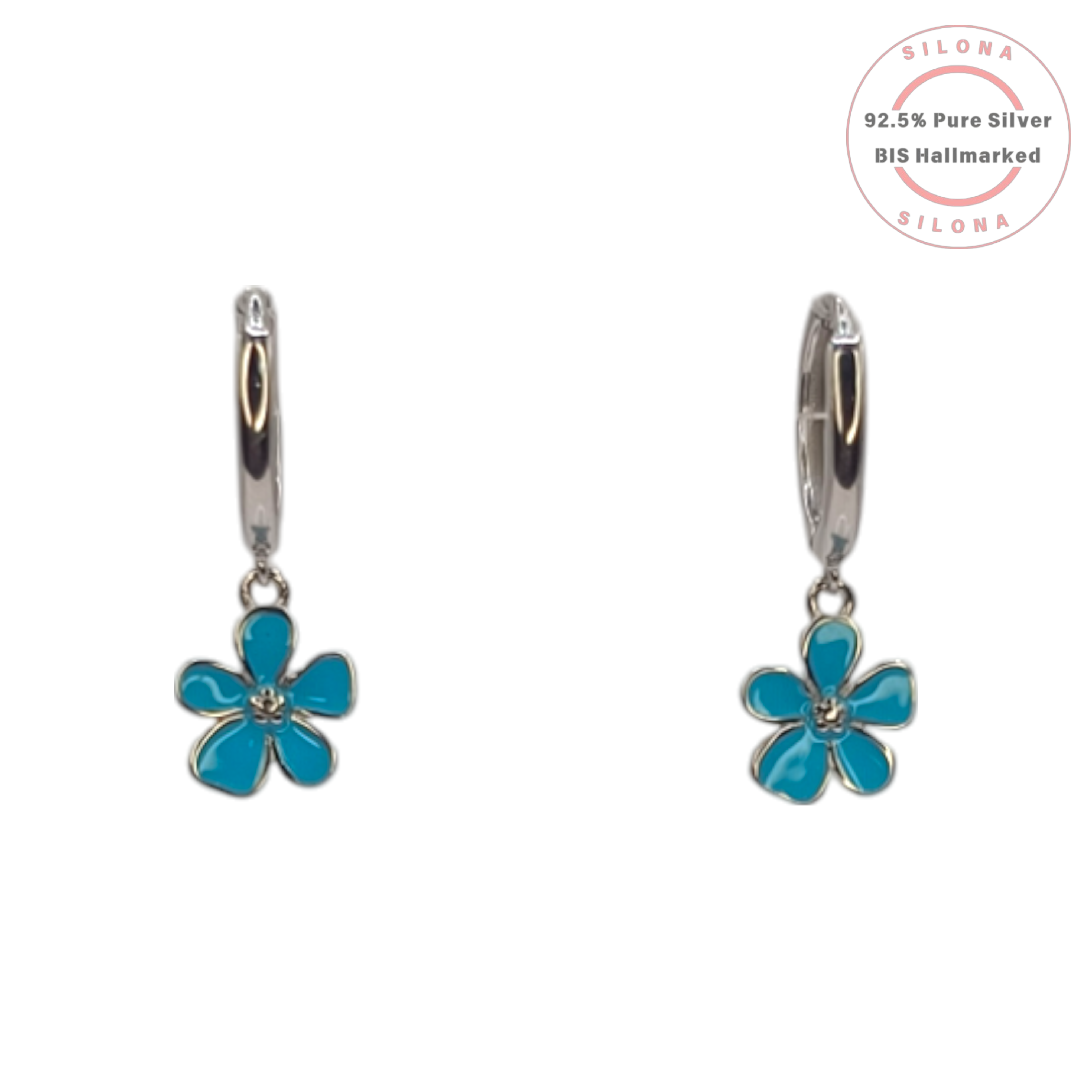 A pair of Silona silver huggie hoop earrings, each with a dangling five-petal flower charm filled with vibrant turquoise enamel, on a white background.