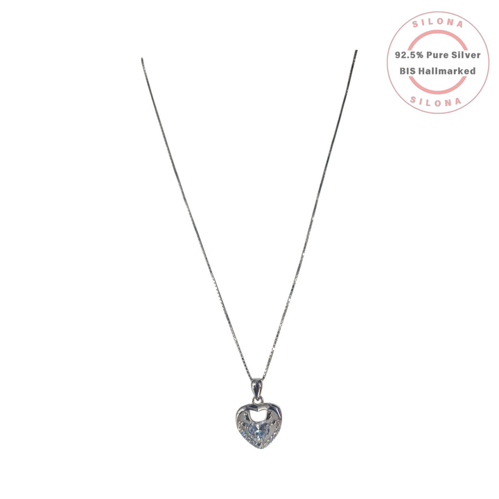 A modern heart pendant necklace in 92.5 silver, featuring a central heart-cut cubic zirconia and pavé accents, on a silver box chain.