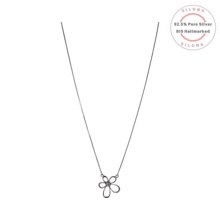 Minimalist open-work flower pendant necklace in 92.5 sterling silver with a cubic zirconia center on a fine box chain.