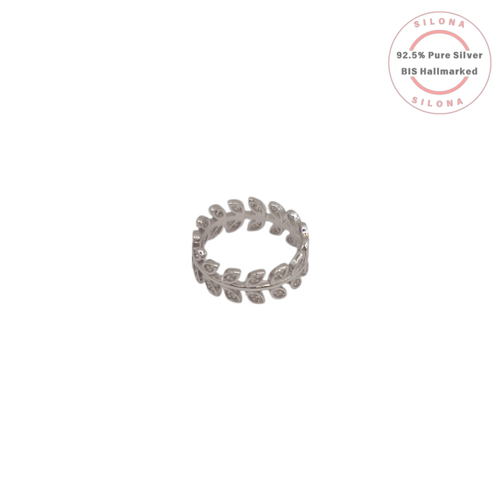 Silona's elegant laurel leaf eternity ring in pure 92.5 silver, studded with cubic zirconia, on a white background.