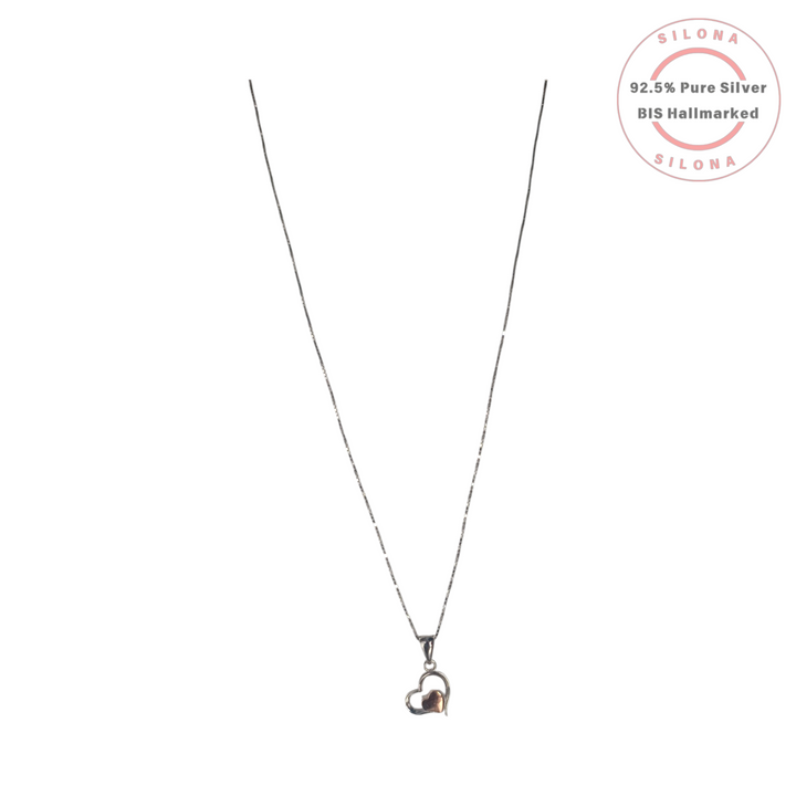 Silona's Two-Tone Double Heart Necklace in 92.5 silver, featuring a rose-gold tone inner heart pendant on a delicate box chain.