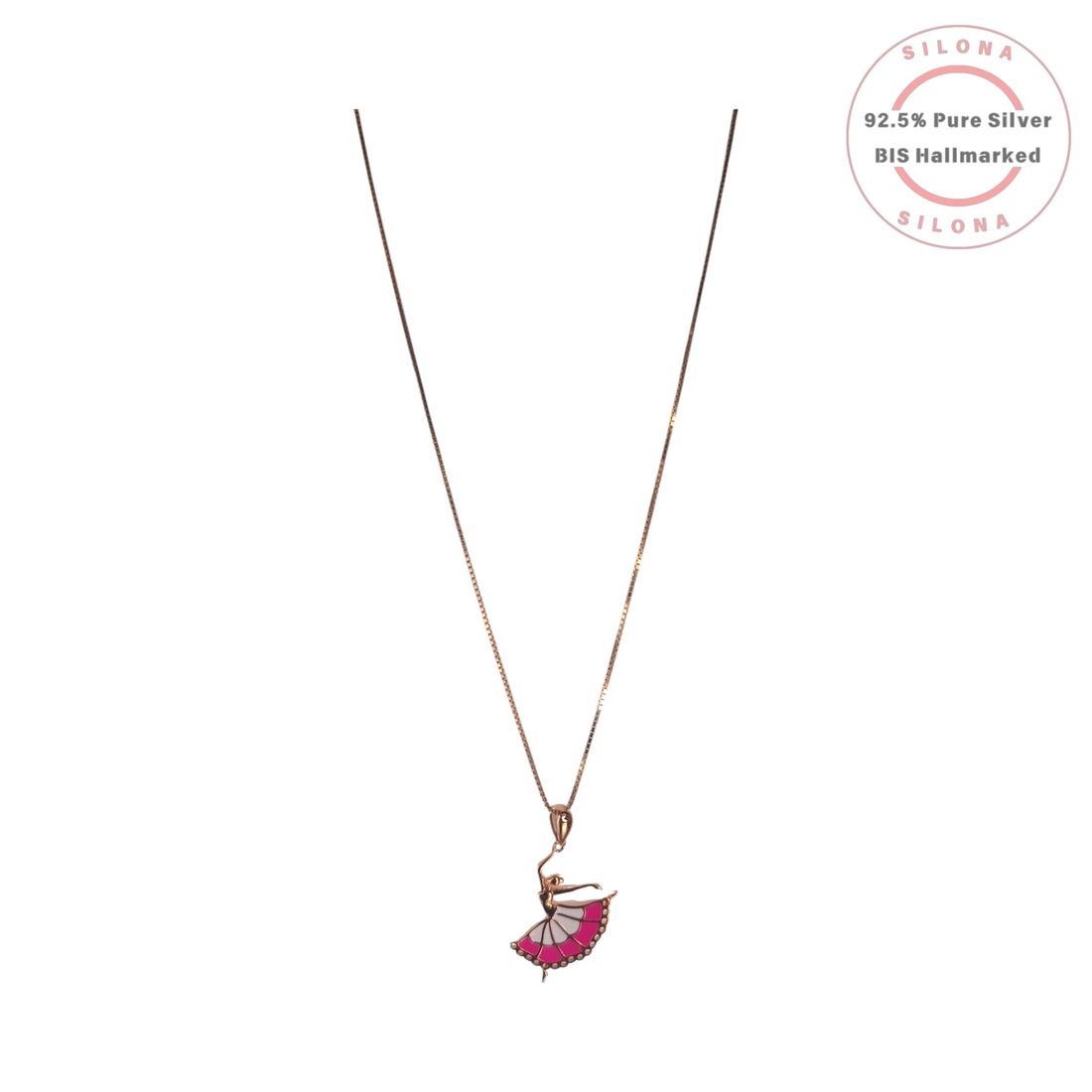 A rose gold plated silver necklace with a delicate box chain and a ballerina pendant. The ballerina's skirt is decorated with fuchsia pink and white enamel.
