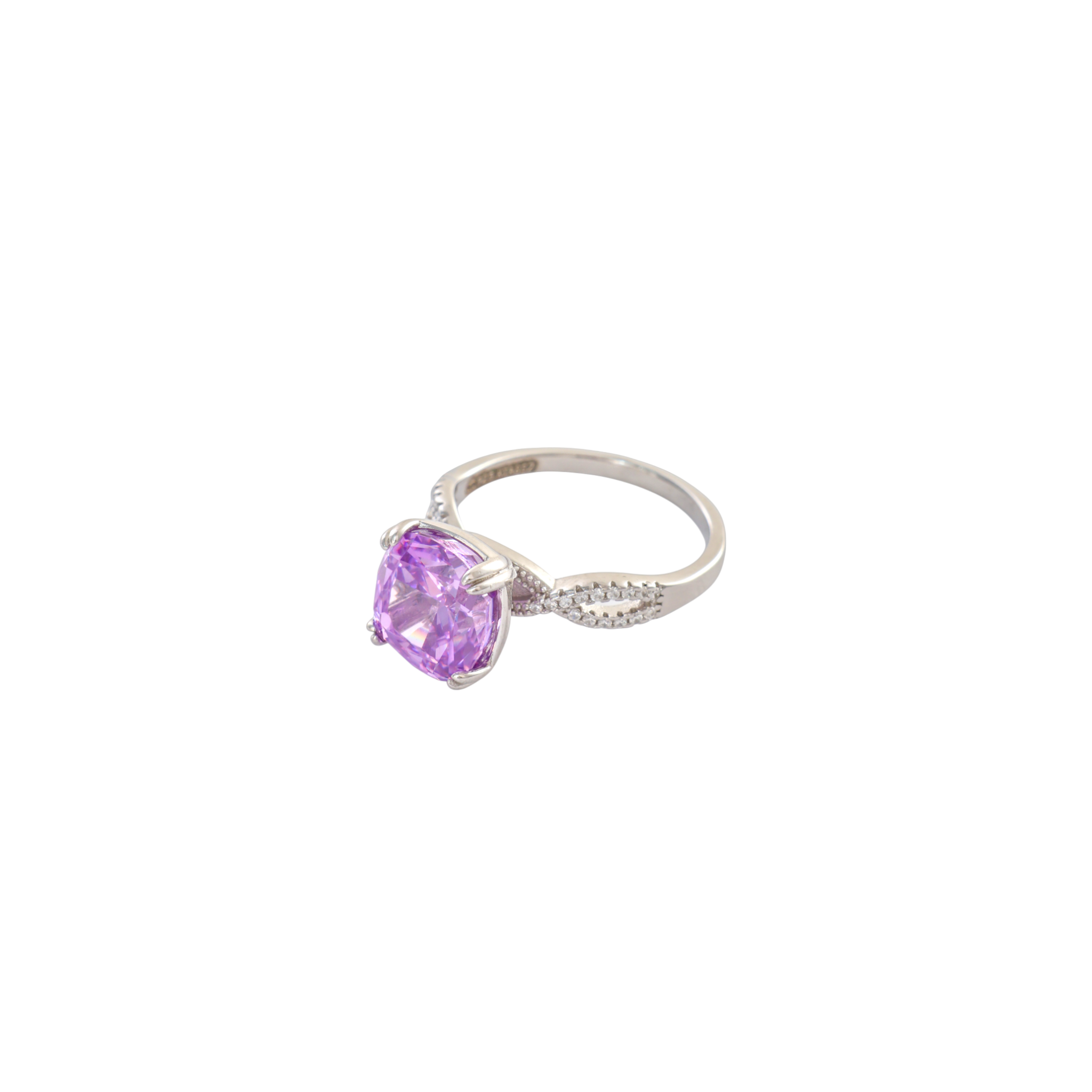 Vibrant purple cushion cut gem with a pave set infinity twisted silver band.