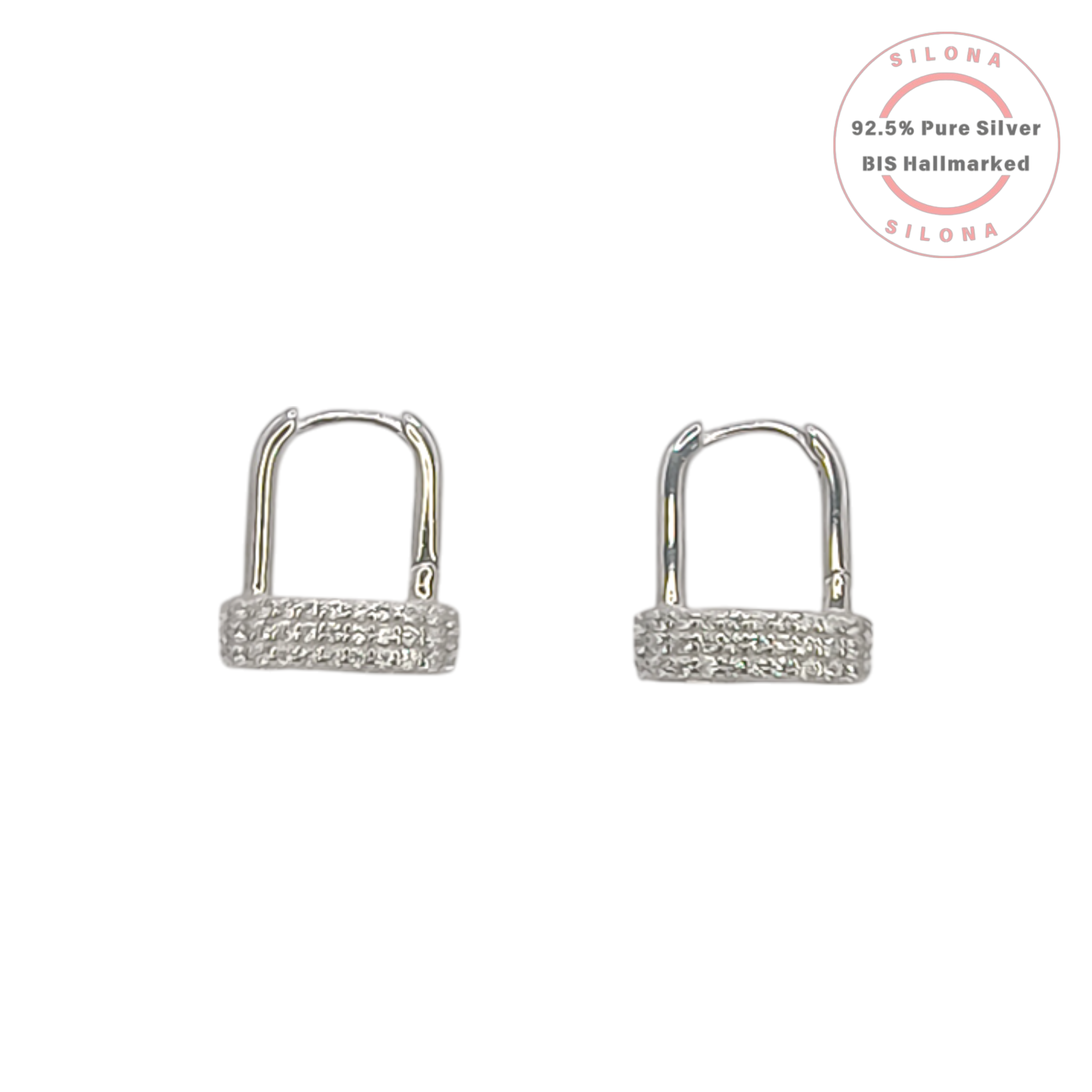 A pair of Silona pavé cubic zirconia huggie hoop earrings in 92.5 silver, shown against a clean white background.