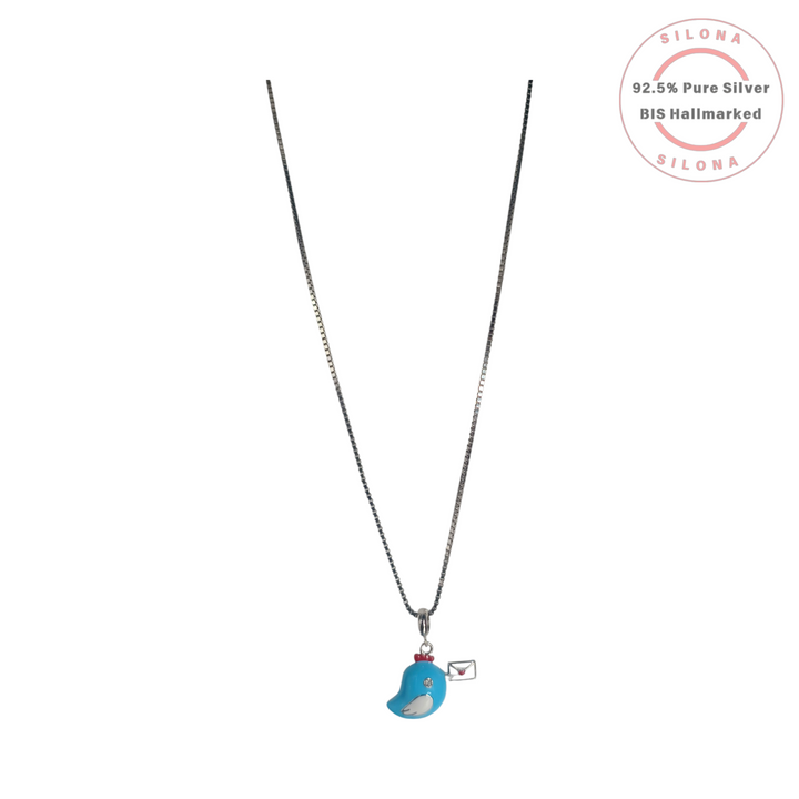 A 92.5 silver box chain necklace with a turquoise enamel messenger bird pendant holding a love letter, with a sparkling stone for an eye.