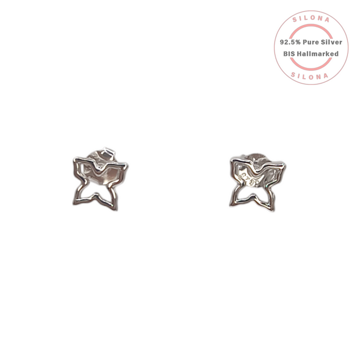 Back view of Minimalist Clover Silver Stud Earrings showing the 925 hallmark stamp and butterfly-shaped earring backs on a white background.