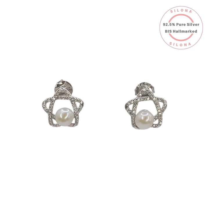 A pair of Starlight Pearl Stud Earrings in 92.5 silver, featuring a central pearl in a star-shaped frame with cubic zirconia, on a white background.