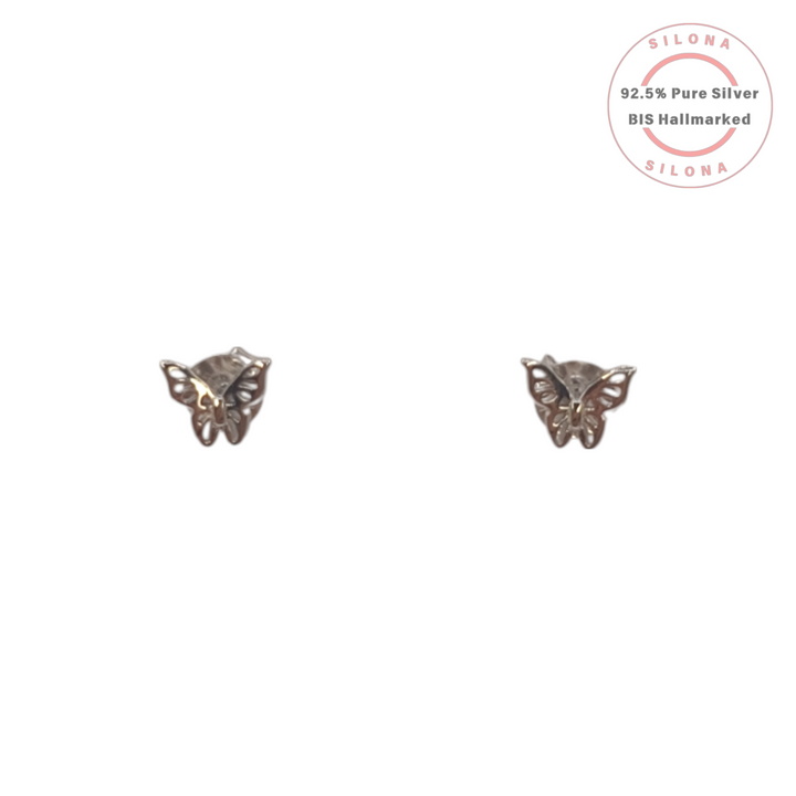 A pair of minimalist butterfly-shaped stud earrings crafted from pure 92.5 silver, shown on a clean white background.