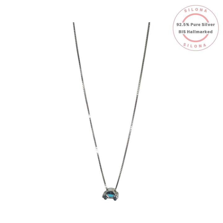 A silver box chain necklace with a small, whimsical silver car charm pendant featuring a bright blue inlay.