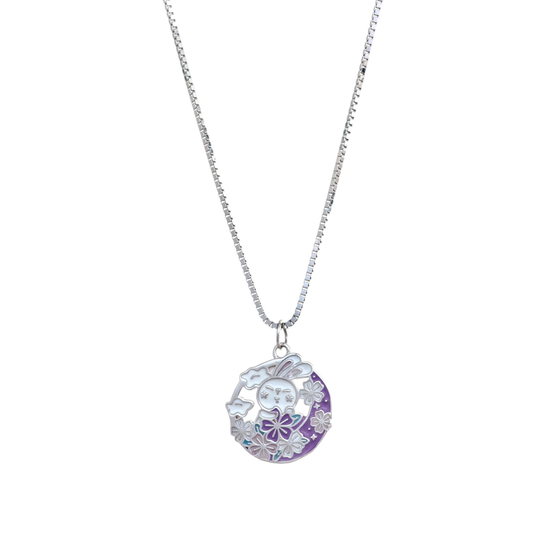 Silver chain necklace with a round medallion pendant featuring a white bunny with purple enamel background and cherry blossoms.