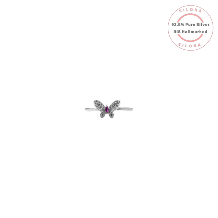 Silona's Dainty Fuchsia Butterfly Ring in 92.5 sterling silver, with cubic zirconia wings, on a white background.