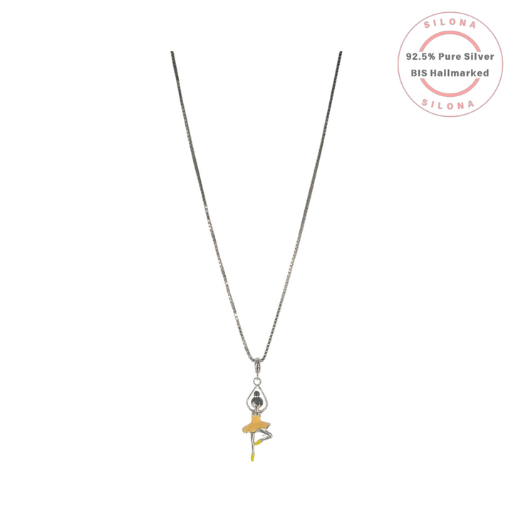 A silver box chain necklace with a ballerina pendant. The ballerina has a yellow enamel tutu, yellow pointe shoes, and a black stone for her head.