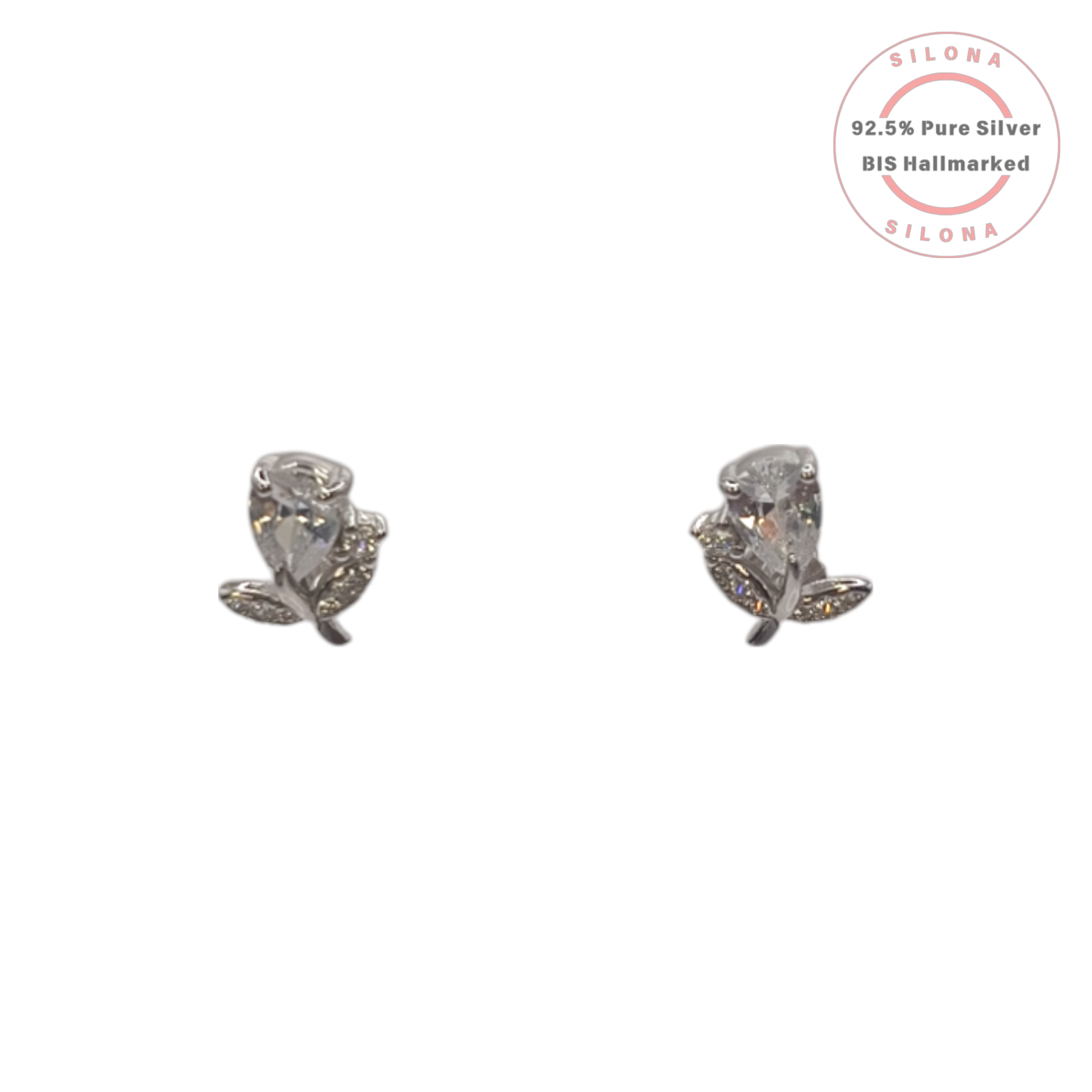 A pair of Silona silver stud earrings featuring a large pear-shaped cubic zirconia with a small, crystal-pavé leaf accent.