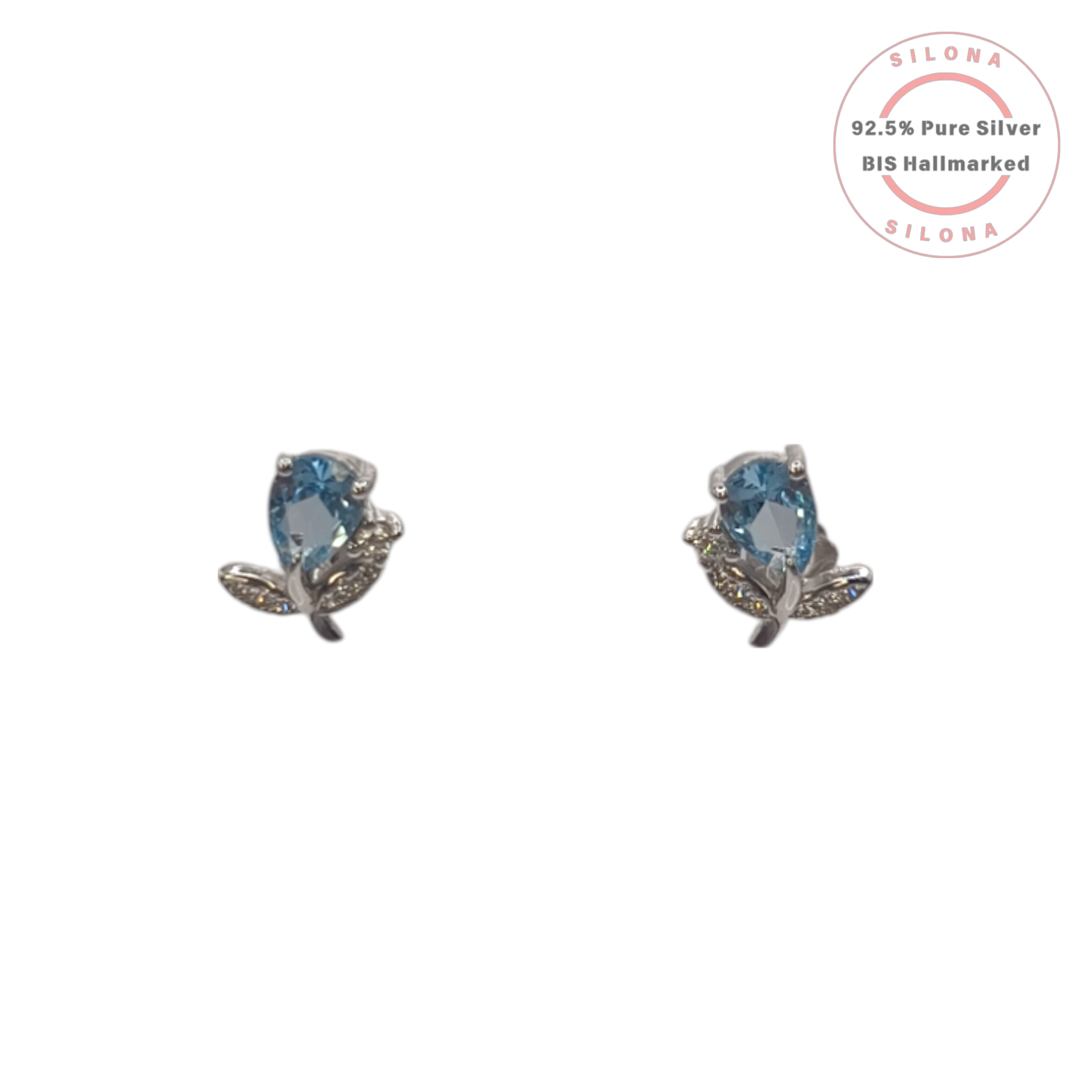 A pair of Azure Pear & Leaf Stud Earrings in 92.5 silver, featuring a pear-cut aquamarine blue stone and pavé-set leaves, on a white background.