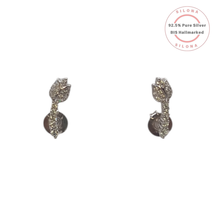A pair of petite tulip bud stud earrings crafted in 92.5 sterling silver, with pave-set clear cubic zirconia stones, against a white background.