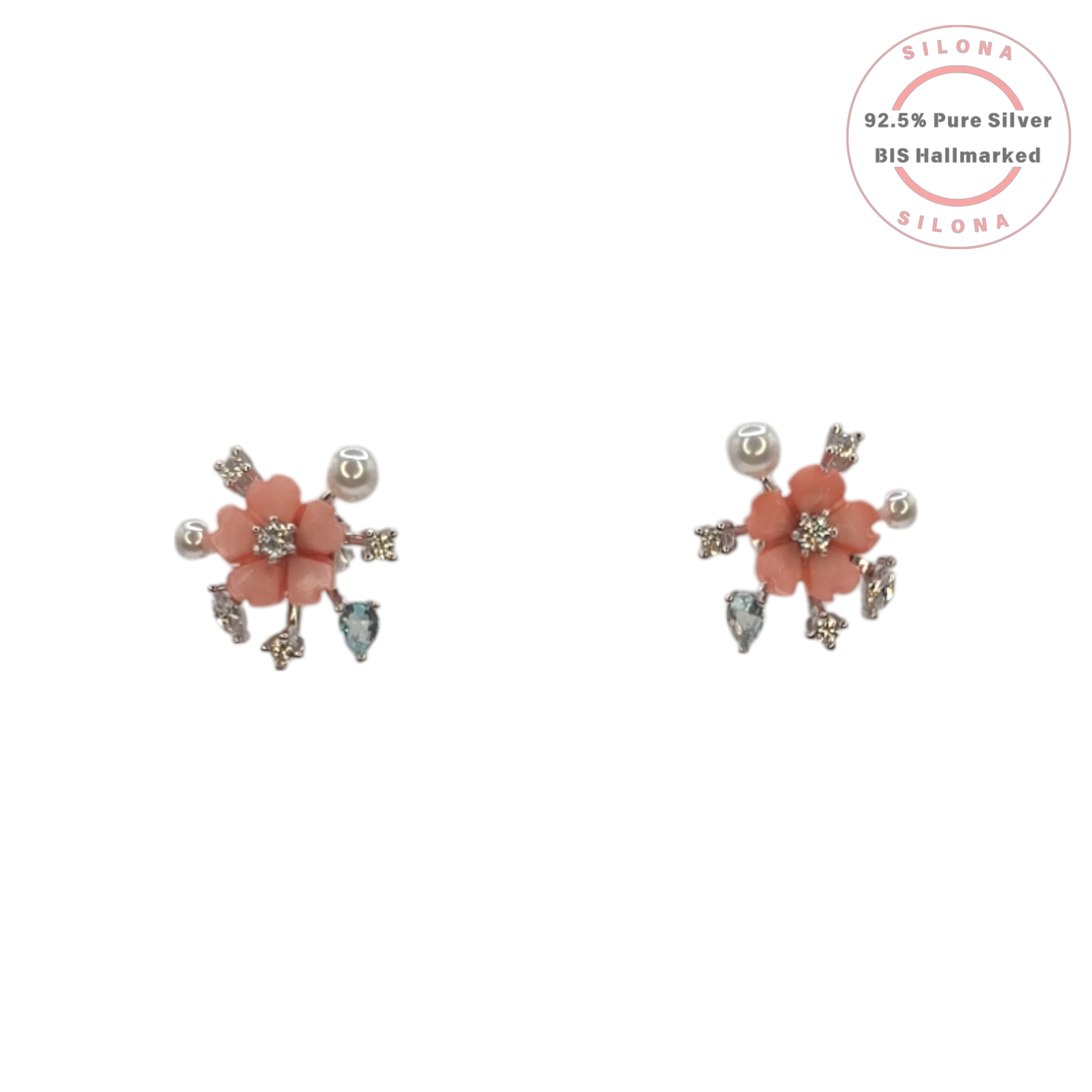 A pair of Silona silver stud earrings featuring a coral pink flower with pearl and cubic zirconia accents, on a clean white background.