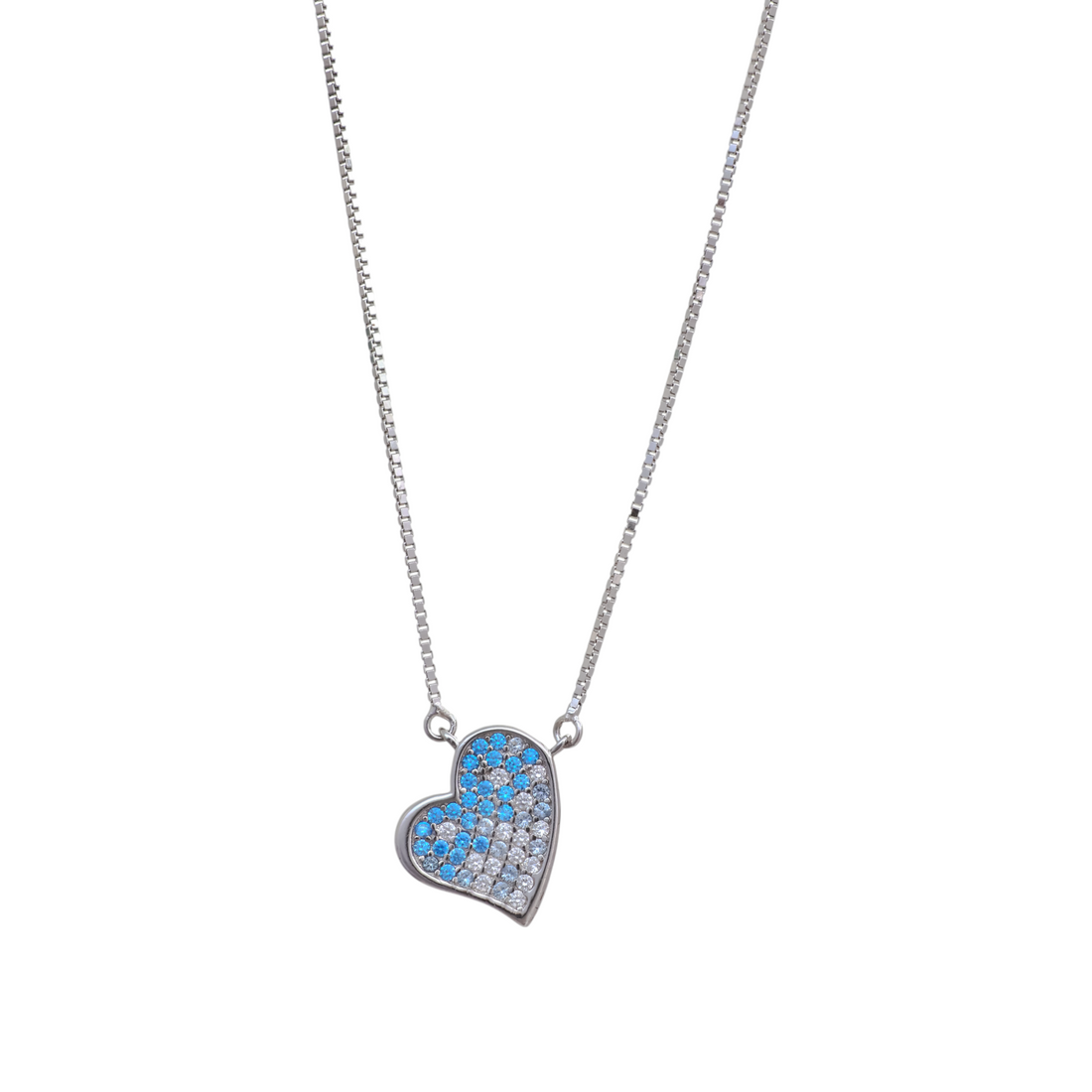Silver chain necklace holding a tilted heart-shaped pendant paved with turquoise blue and clear gradient crystals.