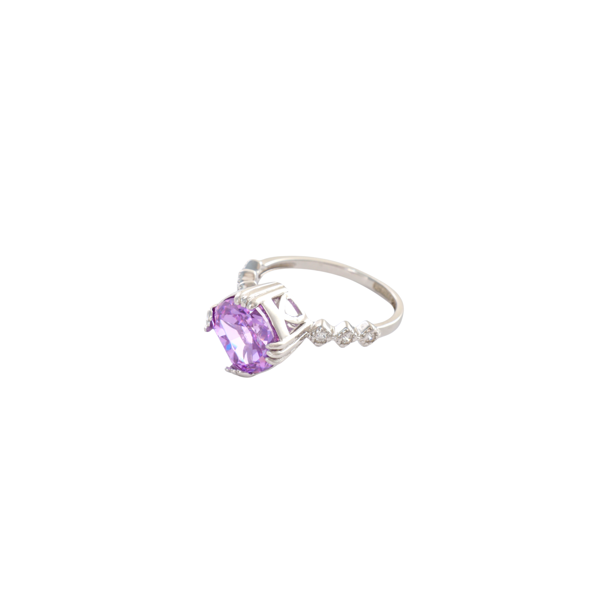 Vibrant violet cushion gem set on an ornate textured silver band with pave accents.