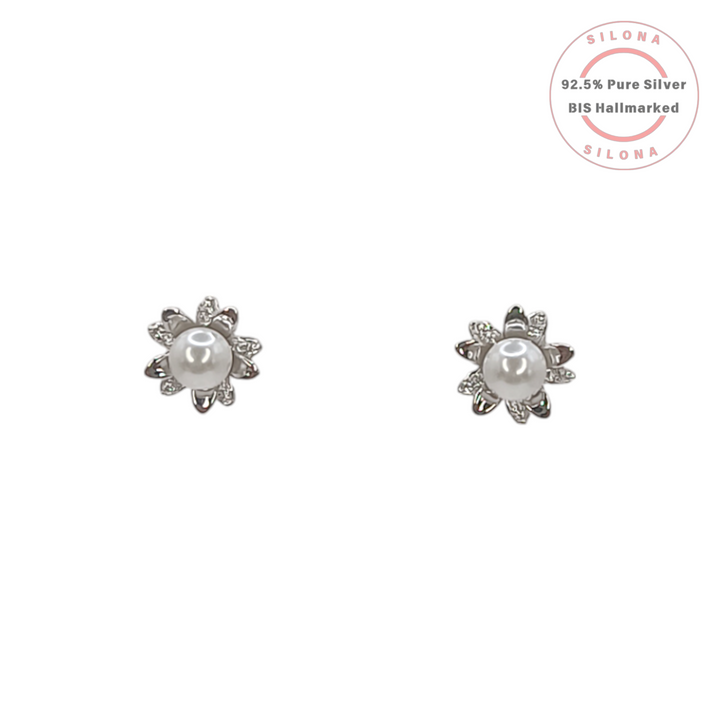A pair of Silona Floral Pearl Blossom Stud Earrings in 92.5 silver with a central pearl and CZ-studded petals, on a white background.