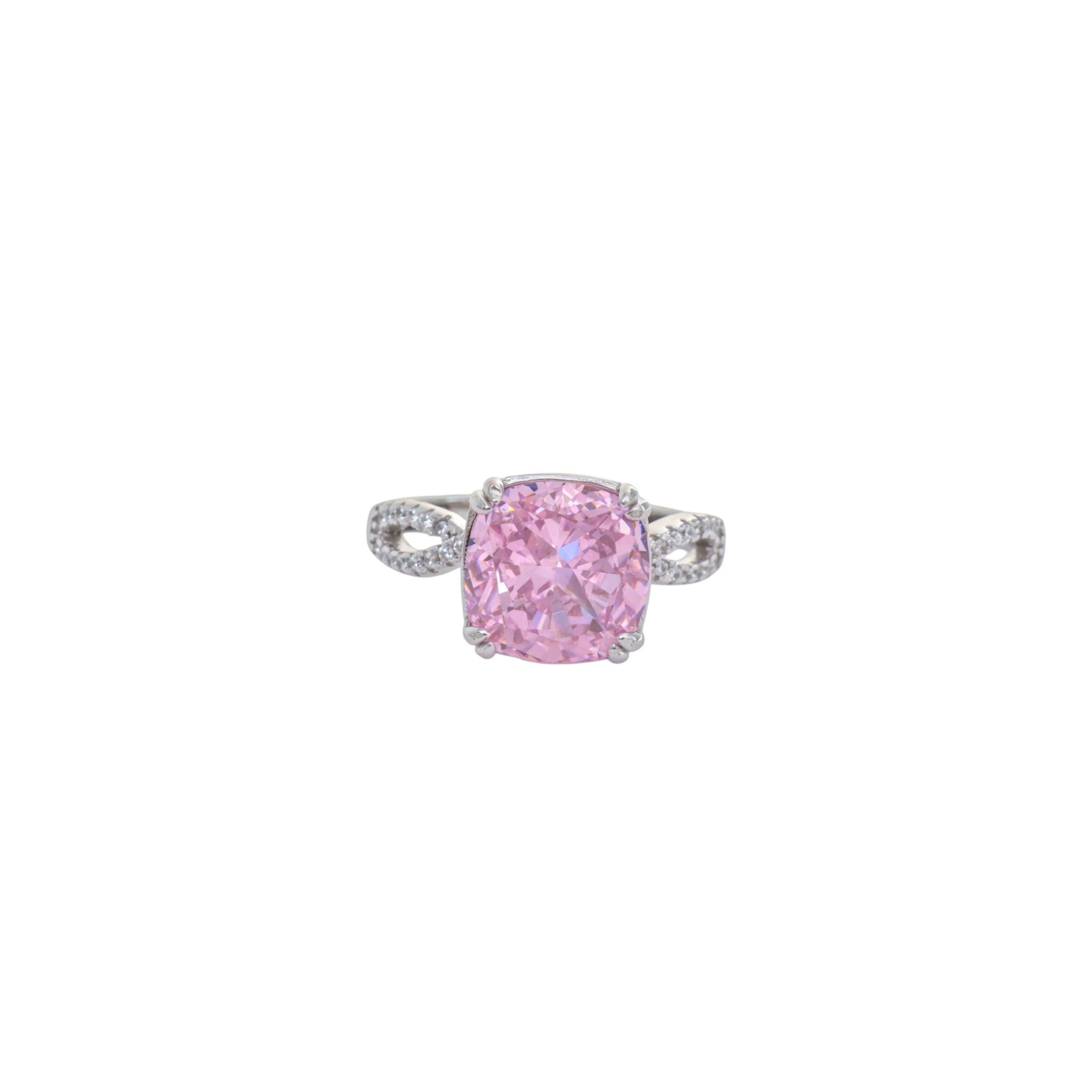 Soft blush pink cushion cut stone mounted on a pave infinity twist silver shank.