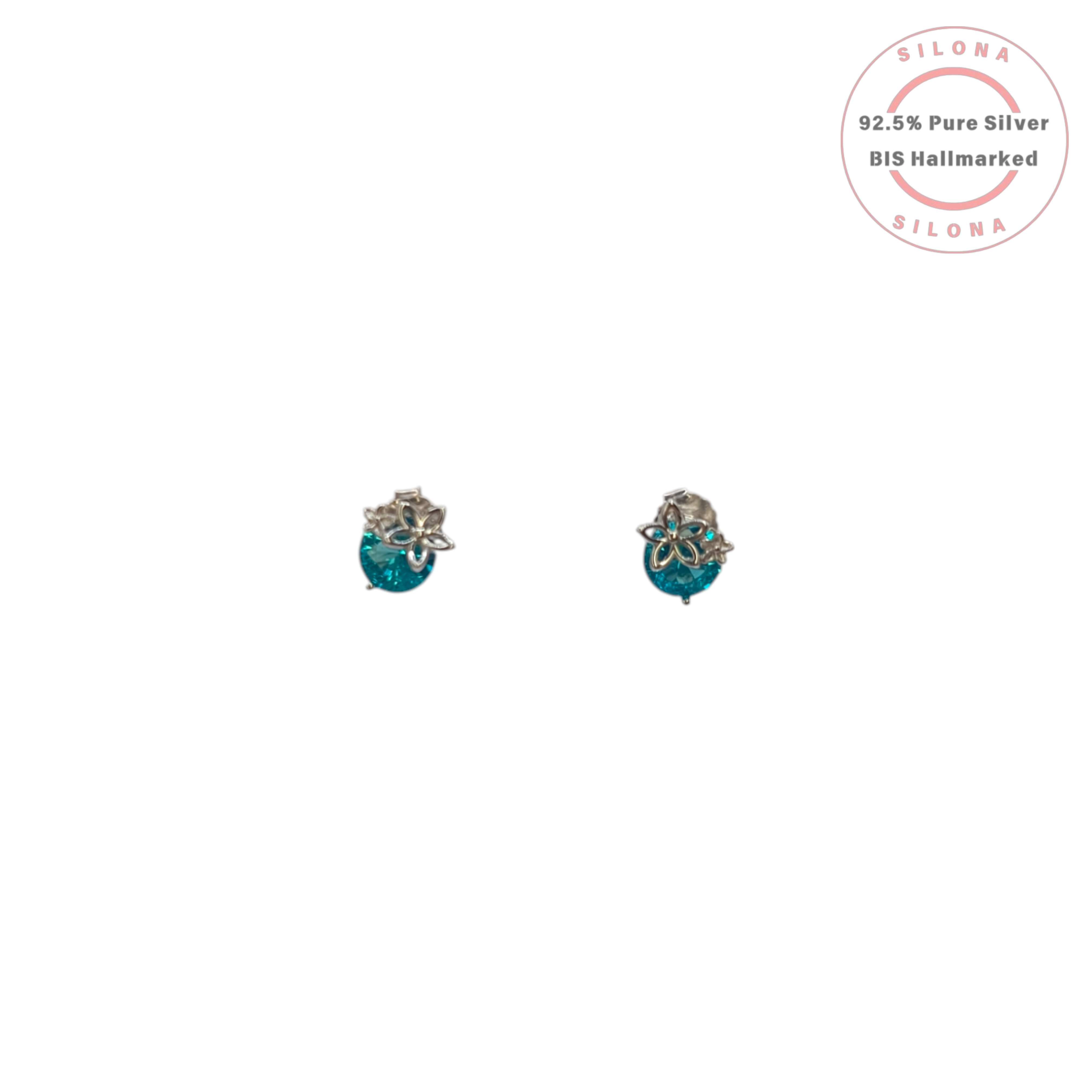 A pair of Azure Floral Stud Earrings in 92.5 silver, featuring a vibrant aqua blue cubic zirconia stone topped with a delicate flower motif, on a white background.