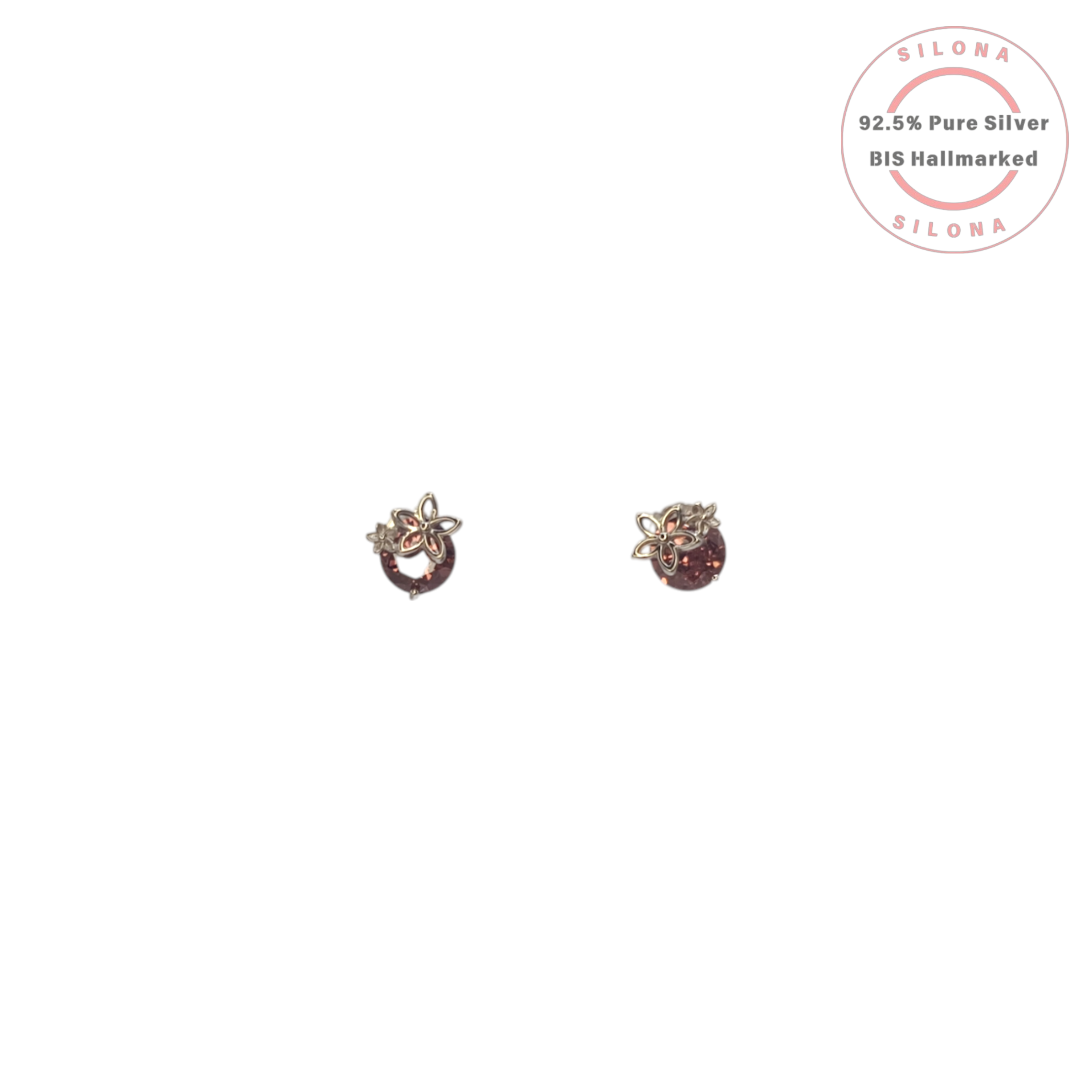 A pair of Silona floral stud earrings in 92.5 silver, featuring a deep garnet-hued round stone topped with a small silver flower motif.