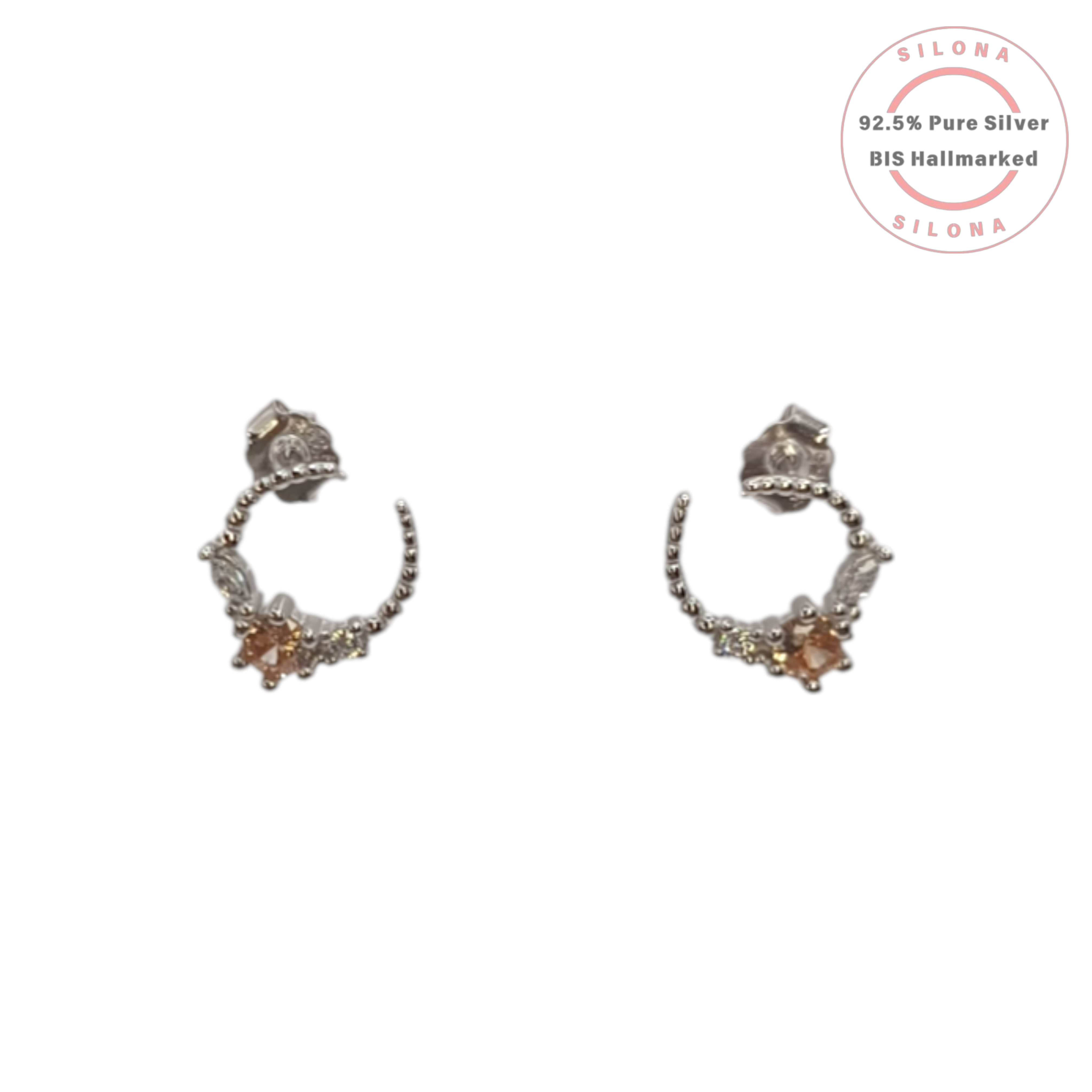 A pair of Silona's delicate silver C-hoop earrings with a beaded band and a cluster of peach and clear cubic zirconia stones on a white background.