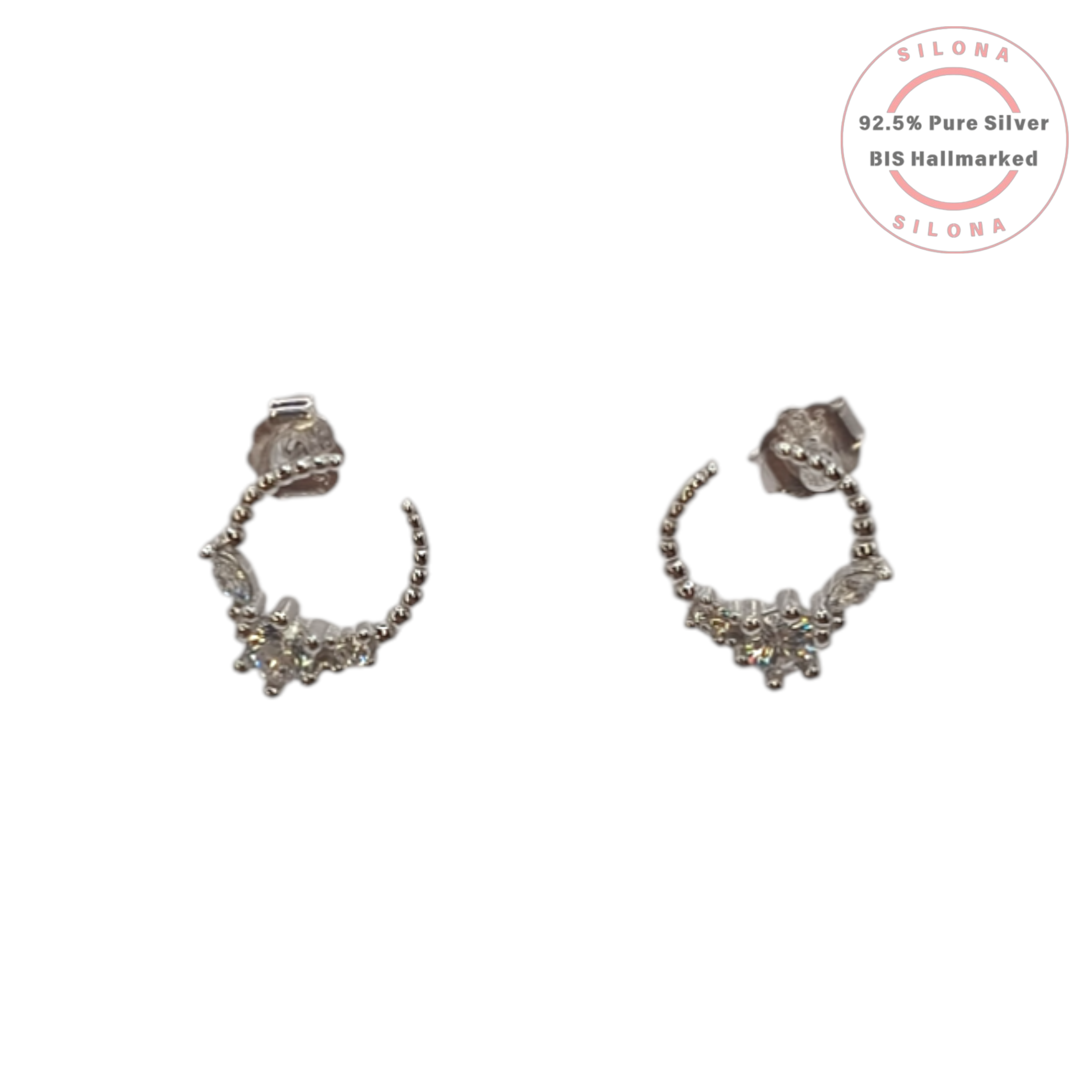 A pair of Silona's Celestial Stardust Half-Hoop Earrings in 92.5 silver with a central cubic zirconia cluster, shown on a white background.
