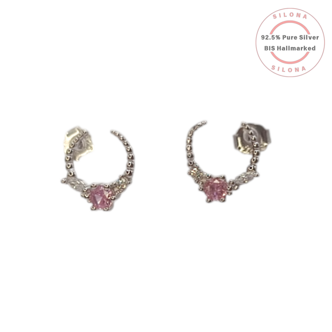 Pair of Silona Celestial Arc stud earrings in 92.5 silver, featuring a central pink crystal and clear marquise cubic zirconia, on a white background.