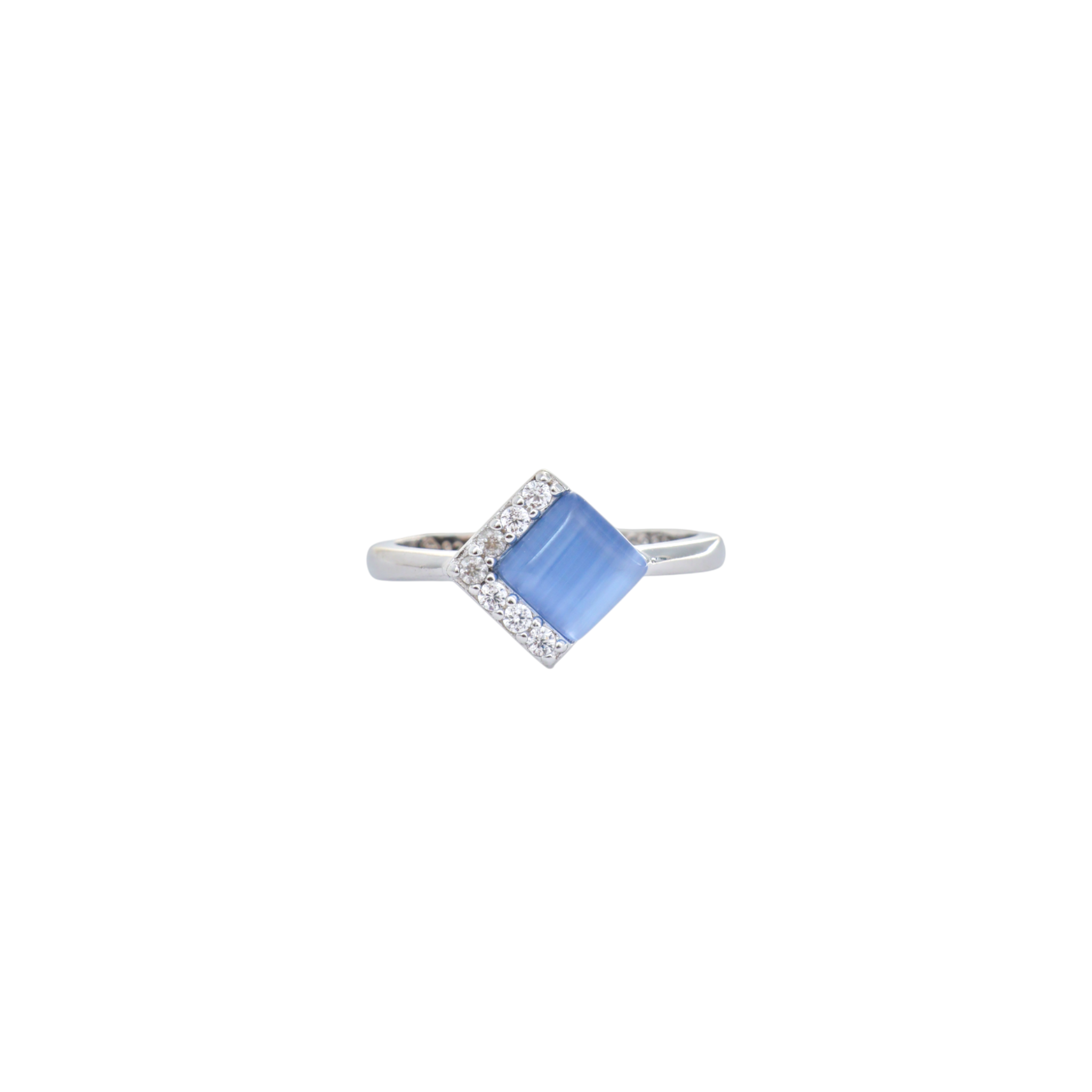 Blue cat's eye cabochon set on point with pave cz corner frame on a silver band.