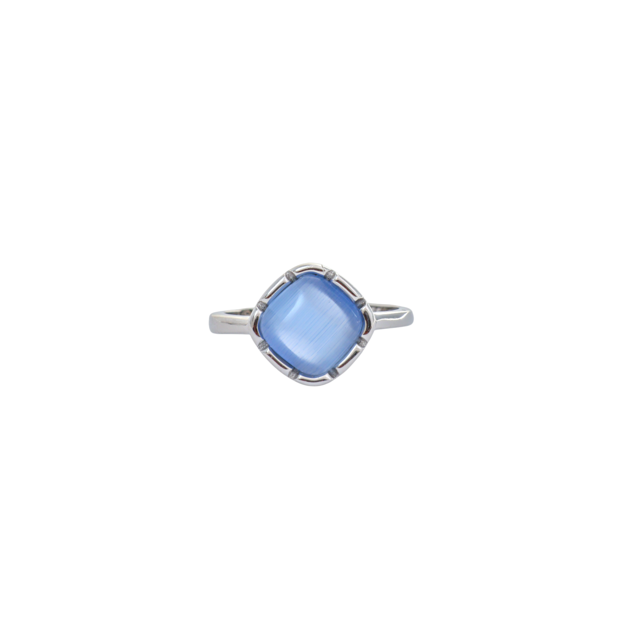 Square light blue cat's eye cabochon gemstone mounted in a classic four prong silver setting.
