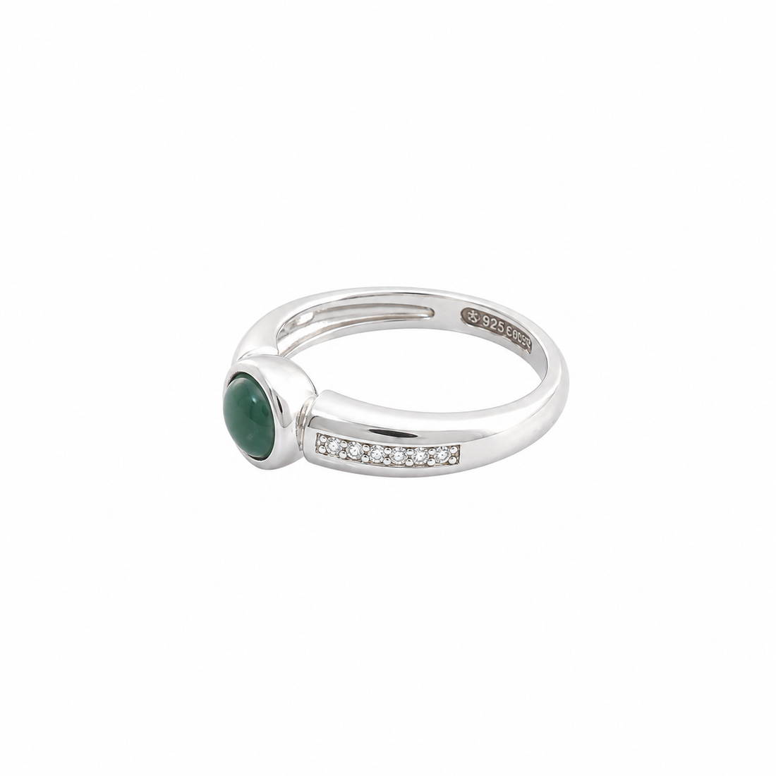 Dark green round jade cabochon mounted on a wide silver band with pave set cz channels.