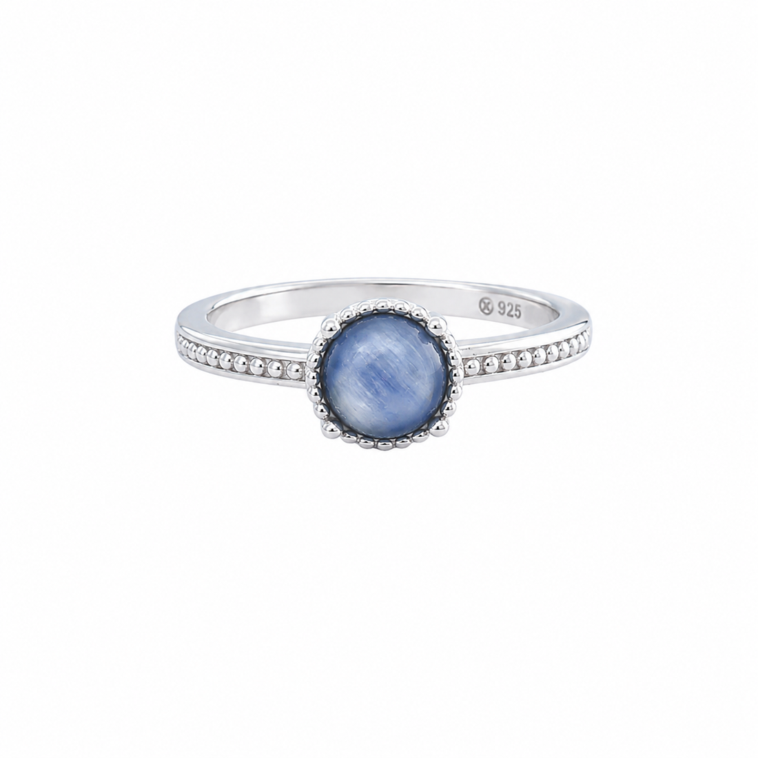 Round blue kyanite stone with chatoyant sheen encircled by a beaded silver halo on a thin band.