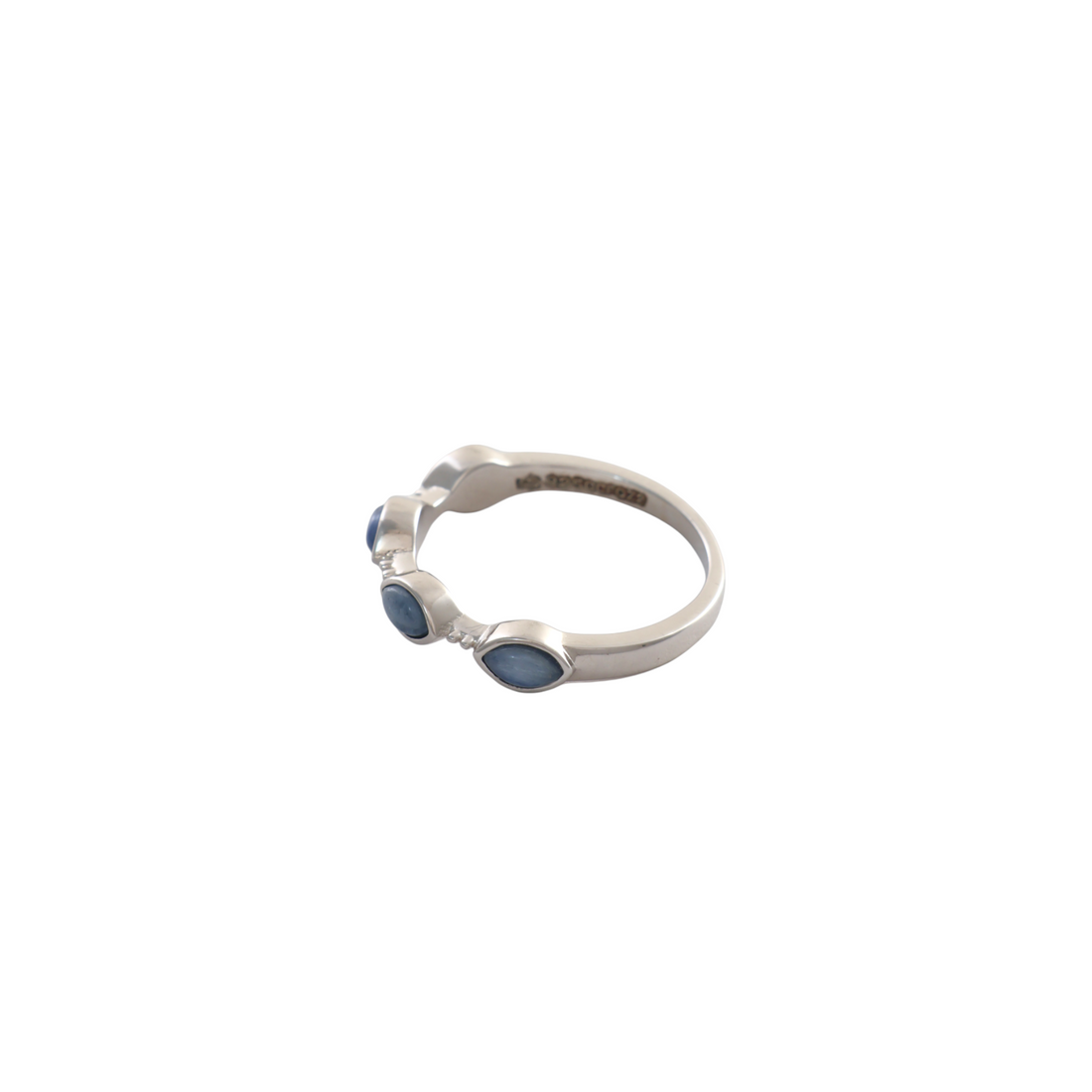 Four marquise kyanite blue stones bezel set sequentially along a slender silver ring band.