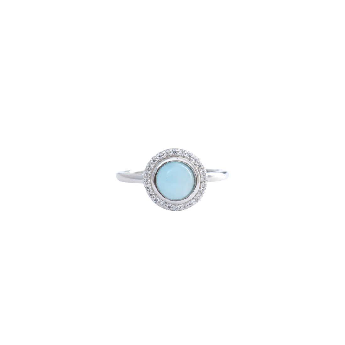 Smooth round sky-blue larimar stone encircled by a radiant pave cz halo on a thin silver band.