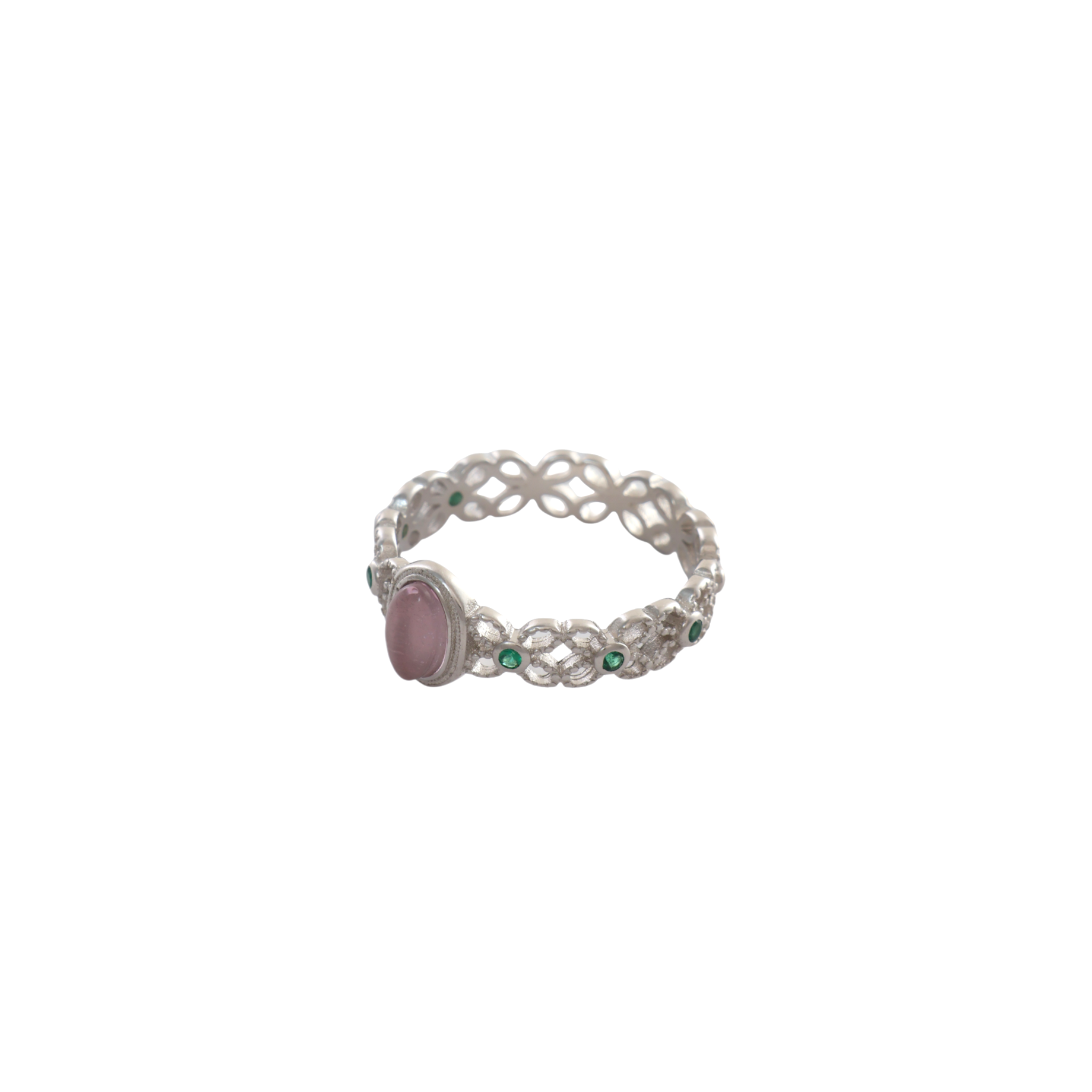Pink oval center stone on an intricate filigree lace silver band studded with green accents.