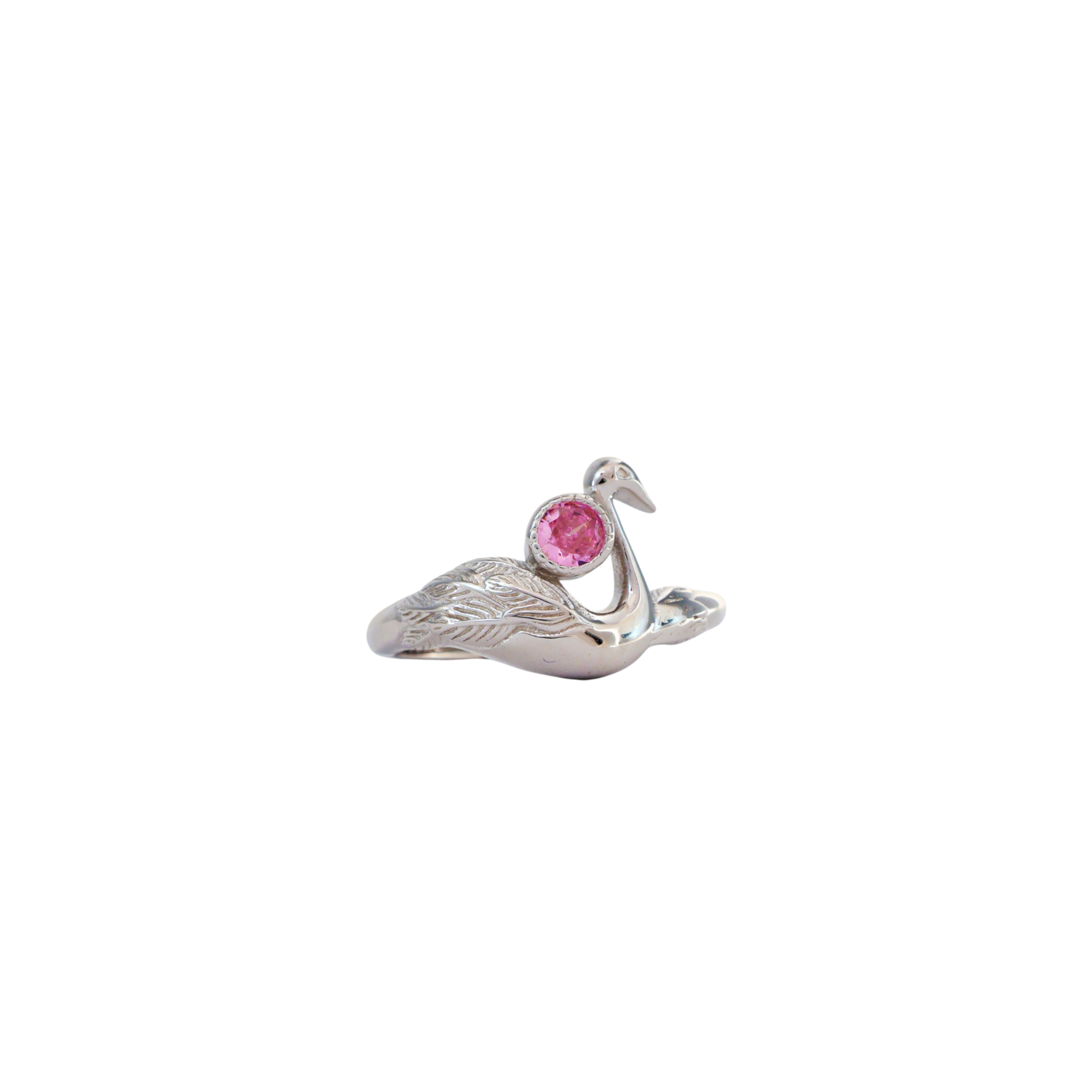 Sculpted silver swan ring wrapped around the finger holding a round pink stone in its neck.