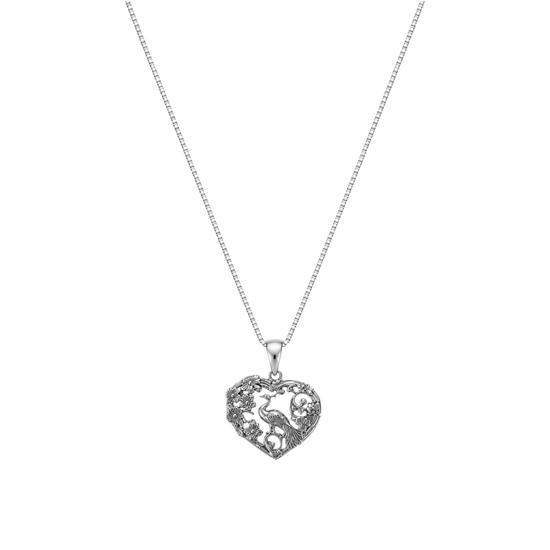 Silver chain necklace featuring an openwork filigree heart pendant with a peacock and floral motifs.