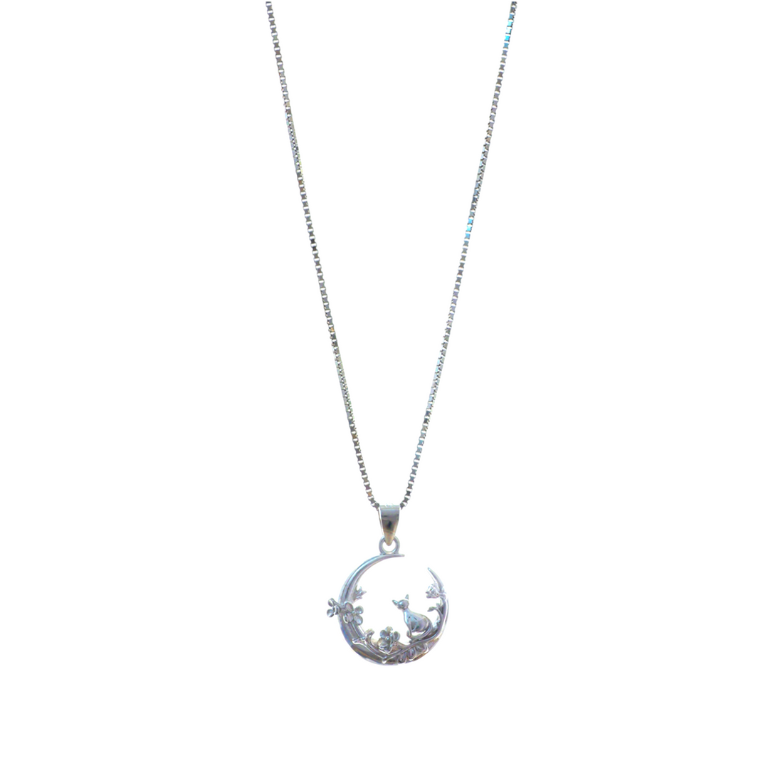 Silver chain necklace with a crescent moon pendant featuring a small silver cat sitting inside.