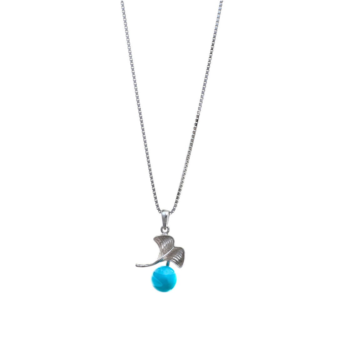 A silver chain necklace featuring a detailed silver leaf pendant with a dangling turquoise-blue bead.