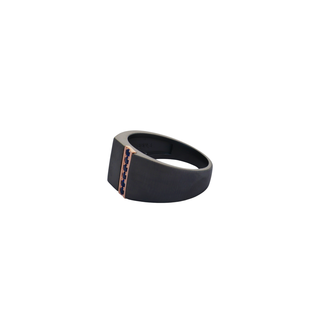 Matte black ruthenium ring featuring a vertical rose gold bar set with five blue round gems.