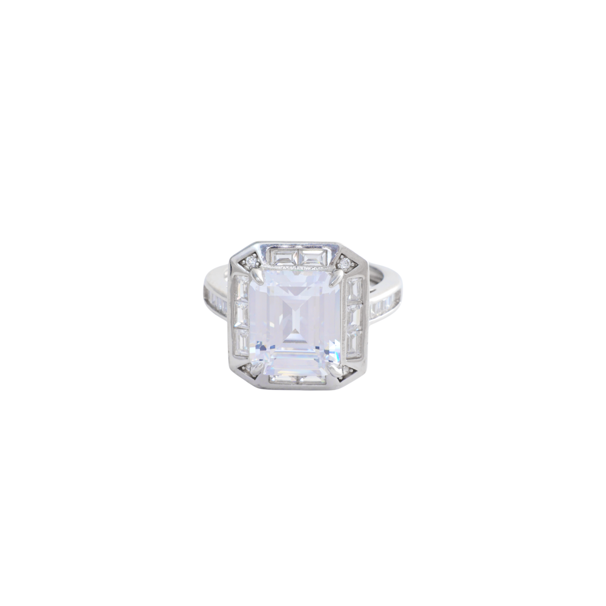 Large clear emerald-cut gemstone surrounded by a baguette crystal halo on a channel-set band.
