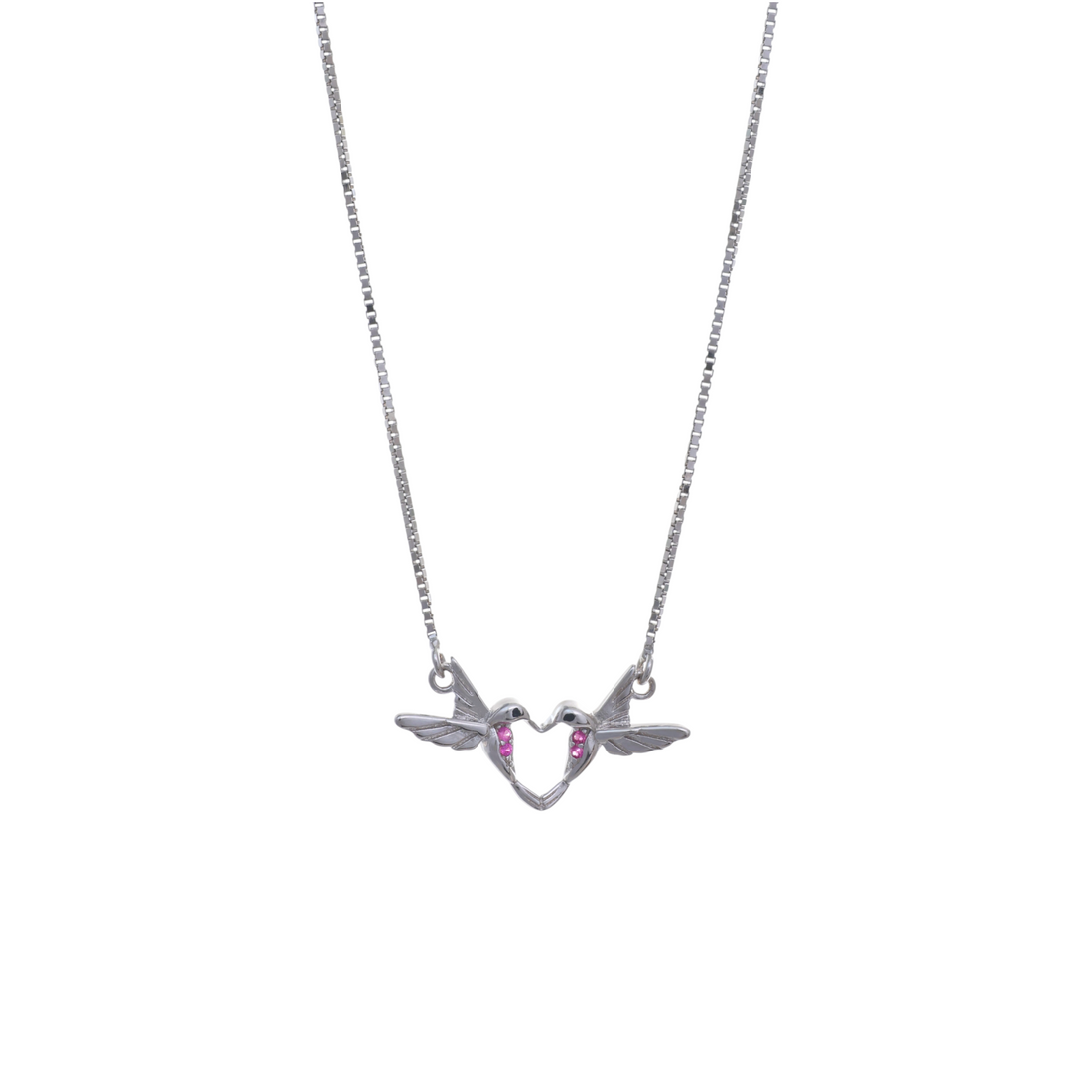 A silver box chain necklace featuring two birds meeting in flight to form a central heart outline with pink gemstone accents.